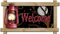 a welcome sign with a lantern on it