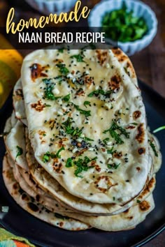 homemade naan bread recipe on a black plate