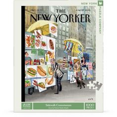 the new yorker puzzle is on display in front of a man and his dog