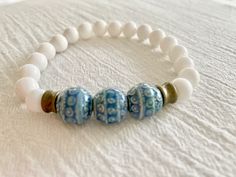 Beaded Bracelet Unique Jewelry Mens Bracelets Handmade - Etsy Bohemian Round Stretch Bracelet For Beach, White Bohemian Stretch Bracelet For Friendship, Bohemian Hypoallergenic Beaded Bracelets, White Bohemian Stretch Bracelet For Meditation, Bohemian Stretch Bracelet For Beach, Bohemian Blue Stretch Bracelet For Everyday, Bohemian Hypoallergenic Bracelets, Spiritual White Stretch Bracelet For Beach, Bohemian Blue Hypoallergenic Beaded Bracelets