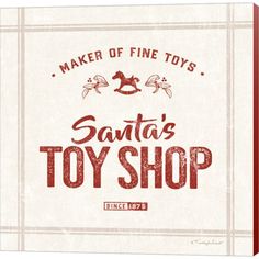 a sign that says maker of fine toys santa's toy shop