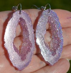 "Beautiful Lavender Pink Hologram Earrings These Faux Geode Earrings Are a Little Bit Transparent-Depending How The Light Hits them. They Are So Pretty! My Photos Do Not Do Them Justice Such a Rainbow When The Light Hits! Earrings Measure About 1 3/4\" x 7/8\" Nice Lightweight Earrings Choose Goldtone or Silvertone Wires at Check Out. Gold Not Pictured Nickle Free Wires Your Earrings Will Arrive In an Organza Bag -Ready For Gift Giving. Made From Epoxy Resin" Purple Resin Drop Earrings, Purple Dangle Hoop Earrings As Gift, Purple Resin Jewelry For Party, Purple Resin Party Jewelry, Purple Resin Earrings Perfect For Gifts, Purple Resin Earrings As A Gift, Purple Resin Earrings For Gift, Purple Pierced Crystal Earrings As Gift, Purple Resin Earrings As Gift