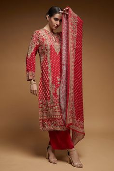 Red straight kurta with all over floral butti prints and rhinestone embroidery. Paired with a plain pant and floral butti print dupatta. - Aza Fashions Red Silk Unstitched Suit With Chikankari Embroidery, Red Silk Unstitched Suit For Navratri, Red Silk Unstitched Suit In Traditional Drape, Red Silk Unstitched Suit With Traditional Drape, Red Elegant Unstitched Suit With Chikankari Embroidery, Elegant Red Unstitched Suit With Chikankari Embroidery, Red Unstitched Suit For Traditional Ceremonies, Red Palazzo Set With Chikankari Embroidery, Red Palazzo Set With Intricate Embroidery And Long Sleeves