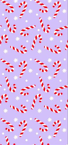 candy canes and snowflakes on a purple background