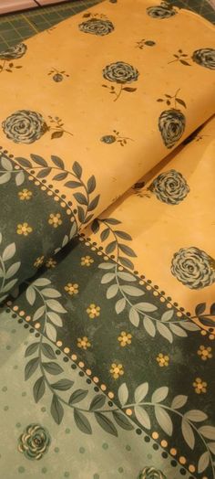 two pieces of fabric with flowers on them