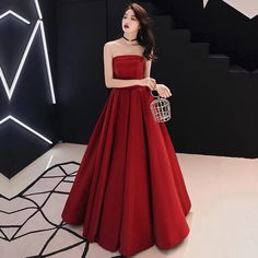 Satin Strapless Ball Gown For Party, Strapless Ball Gown For Prom Season Banquet, Strapless Ball Gown For Banquet And Prom Season, Strapless Off-shoulder Dress For Prom, Formal Red Satin Strapless Dress, Strapless Satin Evening Dress For Banquet, Red Strapless Bodycon Dress, Satin Strapless Evening Dress For Prom, Red Strapless Satin Evening Dress