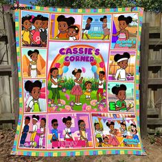 a colorful quilt with black children's pictures on it and the words cassie's corner