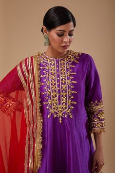 Purple three fourth sleeves short anarkali with gold toned floret gota embroidery and sequin, pearls highlights. Paired with a gota floral jaal embellished salwar and contrasting red kiran lace border organza dupatta. - Aza Fashions Dola Silk Kurta With Gota Work In Traditional Drape, Dola Silk Kurta With Gota Work, Straight Kurta With Gota Work In Dola Silk, Transitional Semi-stitched Kurta With Gota Work, Kundan Anarkali Set With Dabka Work For Transitional Season, Festive Resham Embroidered Anarkali Set For Transitional Season, Festive Resham Embroidery Anarkali Set For Transitional Season, Festive Anarkali With Resham Embroidery, Raw Silk Anarkali Set With Zari Work