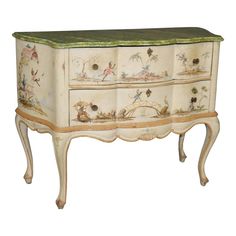 an old dresser with many drawers painted on it