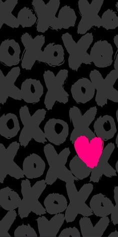 a pink heart is in the middle of black and gray background with small letters that spell out xoxo