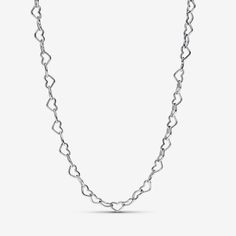 Go for delicate elegance when you choose the Linked Hearts Collier Necklace. Tiny sterling silver linked hearts form an adjustable chain necklace. This design takes a classic shape and reinvents it in the form of a scaled-down, repeat pattern. Equal parts sweet and sophisticated, this sleek sterling silver heart necklace will become a core component of any jewelry collection. Wear with a maximum of 1-2 charms/dangle charms. - Pandora Linked Hearts Collier Necklace - Sterling silver - Sz. 17.7 in Pearl Diamond Jewelry, Custom Charm Bracelet, Rose Gold Plated Ring, Charms Pandora, Sterling Silver Heart Necklace, Gold Armband, Solid Gold Necklace, Solid Gold Earrings, White Gold Necklaces