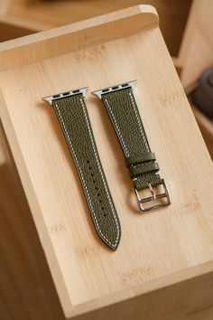 Entirely handmade Olive Green epsom watch strap. The leather epsom comes from the French tannery Degermann, and is used by many luxury brands such as "H" for their leather watch straps. Epsom has a defined grain and is highly resistant to scratches. It is also water resistant and commonly used in bag and wallets. Unlike many other examples listed on Etsy, this strap is entirely hand-stitched and handcrafted by a single Artisan. Please note that this strap is ONLY available for the Apple Watch. I Designer Leather Watch Bands Rectangular, Designer Rectangular Leather Watch Bands, Luxury Silver Leather Apple Watch Band, Luxury Green Watch Accessories With Leather Strap, Luxury Adjustable Watch Bands With Palladium Hardware, Luxury Adjustable Leather Strap Watch Band, Apple Watch Leather Strap, We Watch, Zermatt