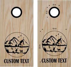 two wooden door hangers with mountains and trees on them, one has a hole in the middle that says custom text