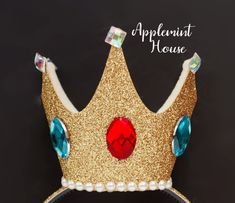 "●APPLEMINT HOUSE IS THE ORIGINAL EMBELLISHED ALL PRINCESS GLITTER CROWN ● *Princess Peach Crown, Princess Peach Super Mario Costume crown, Princess Peach cosplay crown, Baby, girl, Adult, Woman princess peach crown *You will receive ONE crown not a Set *Crown Size: Regular Crown: 2.5\"x 2.5\" Large Crown: 4\" x 4\" *Handmade by Applemint House since 2014 ●HOW DO I MAKE A CROWN?● -My crown is made out of very soft plastic headband (the headband has teeth on it )as a base of the foundation. And I Pink Crown-shaped Headband For Party, Carnival Round Crown Headpiece, Structured Crown For Carnival Party, Carnival Party Structured Crown, Structured Crown For Party And Carnival, Whimsical Tall Crown For Parties, Carnival Crown Costume Hat, Adjustable Crown For Carnival Party, Princess Style Gold Crown With Tall Shape