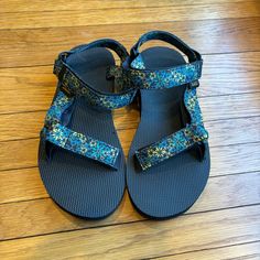 Durable Sandal Has Beautiful Gold And Blue Flowers On The Straps. Great For Hiking Or Every Day. Came With A Tiny Hole In The Footbed So Price Reflects. New Without Tags. Blue Flip Flops For Spring Outdoor, Blue Flip Flops For Spring Outdoor Activities, Blue Sport Sandals For Summer Hiking, Blue Open Toe Sport Sandals For Hiking, Teva Geotrecca, Non-slip Open Toe Sport Sandals For Hiking, Teva Voya, Teva Sandals Verge, Teva Shoes