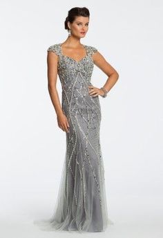 This platinum grey colored evening gown has a lot of beading and embellishments… Vampire Dresses, Cocktails Dresses, Sons Wedding, Empire Wedding Dress