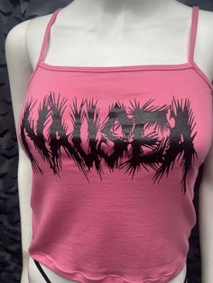 This is a pink Nausea crop tank top with spaghetti straps. This has a Nausea image screen printed on the front. 57% cotton/ 38% polyester/ 5% Spandex These are handmade screenprinted and slightly vary from the photo. Please feel free to email me any questions. Thanks for looking. I do not do exchanges and I do not take returns unless the item is damaged. I thoroughly check each item before it is shipped out. The seller is not responsible for any lost or stolen packages. Pink Sleeveless Y2k Crop Top, Y2k Tank Top For Spring Alternative Fashion, Spring Y2k Tank Top For Alternative Fashion, Y2k Style Tank Top For Spring Alternative Fashion, Y2k Pink Graphic Print Tank Top, Punk Sleeveless Crop Top For Spring, Punk Tank Top For Spring Concert, Punk Style Tank Top For Spring Concert, Fitted Pink Tank Crop Top