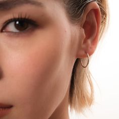 Make a delicate statement with the refined Joop 925 Sterling Silver Hoop Earrings, available in three sizes to suit any occasion. Wear single for a classic look or layer them up for a more edgy style. Metal: 925 Sterling Silver / 14K Solid Gold Dimensions: 16mm / 0.63"x 16mm / 0.63" Weight: 0.5g Slim Ring, Small Hoop Earrings, Types Of Buttons, Edgy Style, Sterling Silver Hoop Earrings, Sterling Silver Hoops, Gold Hoops, Love Necklace, Silver Hoops