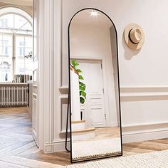 This PAX hack makes the perfect built-in for a pitched ceiling | Livingetc Arched Full Length Mirror, Floor Length Mirror, Full Mirror, Full Length Floor Mirror, Simple Home Decor, Leaning Mirror, Mirror Hanging, Arched Mirror, Full Body Mirror