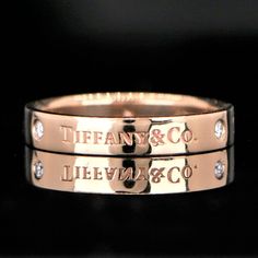 18k Rose Gold Band Weighs 5.7g 3 Round Diamonds, Total Weight 0.09ct Diamond F Color Vs1 Clarity Band Is 4mm Wide Band Is Size 8.75 (This Ring Is Not Re-Sizable) Band Is Stamped "Tiffany&Co. Au750" Retail Price $1,800 + Tax No Original Box Or Papers, Comes With A Generic Ring Box. Stock # 18818 Tiffany Ring, Tiffany Rings, Diamond Logo, Money Laundering, Rose Gold Band, Rose Gold Diamonds, Ring Band, Wide Bands, Gold Band