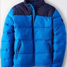 American Eagle Ae Colorblock Mock Neck Puffer Jacket Brand New With Tag Blue Outdoor Outerwear With Contrast Color, Casual Outerwear With Contrast Color For Outdoor Activities, Cold Weather Long Sleeve Color Block Outerwear, Color Block Long Sleeve Outerwear For Outdoor Activities, Navy Color Block Outerwear For Winter, Blue Hooded Outerwear With Contrast Color, Blue Puffer Jacket With Pockets For Outdoor, Casual Nylon Outerwear With Contrast Color, Winter Color Block Outerwear For Outdoor Activities