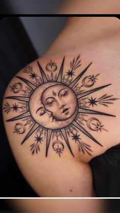 a woman's stomach with a sun and moon tattoo on the back of her shoulder