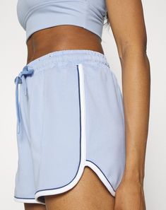 Cotton On Body Women's Retro Gym Shorts Periwinkle Blue Medium The wear-everywhere retro gym short is the ideal garment for the coming season. It has an easy relaxed fit style and elasticated waist with drawcord. This durable cozy short can be perfectly matched with lightweight tops or jumpers for a fresher style. Approximate model height is 5'6" and she is wearing a size S Mid-thigh length, approximate inseam - 2", compression fit Inspired for - training, running, cycling, yoga Shorty short len Fit Inspired, Retro Gym, Training Running, Periwinkle Blue, Lightweight Tops, Gym Shorts, Fit Style, Cotton On, Model Height