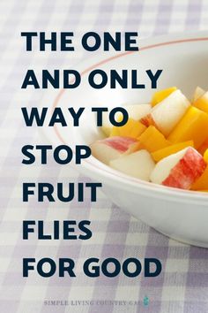 a white bowl filled with fruit sitting on top of a checkered tablecloth covered table