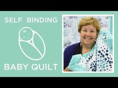 a woman holding a baby quilt with the words self binding in front of her face