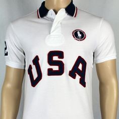 New With Tags Polo Olympic Polo White Polo Collar Sports Top, Casual White Letter Print Polo Shirt, White Collared Sporty T-shirt, Sporty White Collared Tops, Classic White Sports Top, White Cotton Polo Shirt For Sports, White Cotton Sports Shirt, Casual White T-shirt With American Flag Print, White Patriotic Shirt With Flag Print