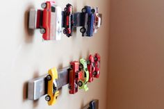 there is a wall mounted with cars on it