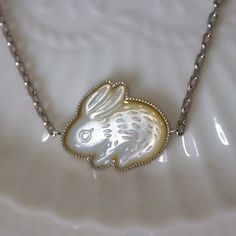 Mother of Pearl Bunny Necklace. Pet Jewelry. Rabbit Owner Gift - Etsy Exquisite Engraved White Jewelry, Exquisite White Engraved Jewelry, Luxury Necklace With Sterling Silver Clasp For Gift, Carved Silver Necklace For Gift, Silver Carved Necklace For Gift, White Mother Of Pearl Fine Jewelry, Luxury Silver Mother Of Pearl Jewelry, Delicate Mother Of Pearl Jewelry Gift, Delicate Mother Of Pearl Jewelry For Gift