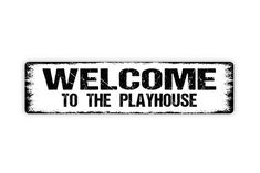 a black and white sign that says welcome to the playhouse on it's side