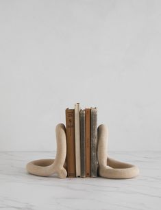 a bookend made out of two books sitting on top of each other