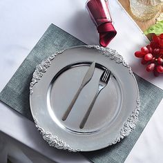 Elegant Embossed Rim Design: Features a detailed, embossed rim that adds a touch of sophistication and luxury to any table setting, making it perfect for weddings and other formal events. 13-inch Diameter: Large enough to accommodate standard dinner… Wood Plate Chargers, Silver Charger Plates, Silver Chargers, Gold Charger Plate, Charger Plate, Square Plates, Charger Plates, Antique Design, Event Catering