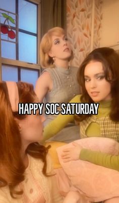 three women sitting on a bed with the caption happy socc saturday