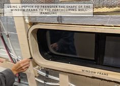 a woman looking out the window of an rv