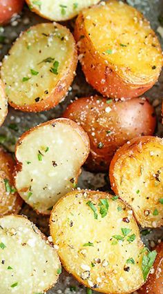 potatoes with herbs and seasoning in a pan