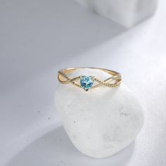 "[ Made to Order ] * Metal: 925 Sterling Silver * Custom Gold Color: Rose Gold plated, Yellow Gold plated, Silver * Main Stone Type: Swiss Blue Topaz, Heart, 4mm * Gold KT: 14K Gold * Custom Gold Color: Rose Gold, Yellow Gold, White Gold * Main Stone Type: Swiss Blue Topaz, Heart, 4mm Jewelry Maintenance Tips - avoid chemicals - avoid collision - clean with a soft cloth - avoid water - remove jewelry before going to bed - stored inside the box --------------------------------------- You can also Ring Gold Wedding, December Birthstone Ring, Peach Morganite, Wedding Promises, Bypass Ring, Custom Ring, Swiss Blue Topaz, December Birthstone, Color Ring