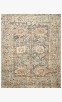 an antique rug with many different colors and patterns on the carpet, including blue, orange,