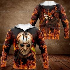 a hoodie with the image of a person wearing a mask and flames on it