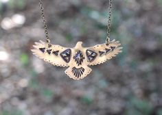 "This listing is for one hand stamped brass hawk necklace. Wear this bohemian necklace to show your affinity and love for all things natural, spiritual, and sky-bound. It is a powerful and eye-catching piece. - Hawk is made from 18 gauge brass sheet metal. This is a sturdy piece- it is not flimsy. - Pendant measures 3\" by 1 1/4\" (75mm by 30mm) - Chain in photo measures 16\" from end to end, but can be lengthened to your preference. Choose at check-out! Also, I can suspend it on black or brown Spiritual Etched Brass Necklace, Bohemian Hand Forged Necklaces For Festivals, Bohemian Engraved Brass Necklaces, Bohemian Brass Necklace With Etched Details, Bohemian Stamped Jewelry For Jewelry Making, Bohemian Etched Necklaces For Festivals, Bohemian Brass Stamped Jewelry, Bohemian Stamped Brass Jewelry, Bohemian Etched Bronze Jewelry