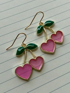 Pink love heart cherry earrings are a must have accessory for your summer outfit 💖 Perfect for that hot summer bbq or to add a touch of juice to your beach outfit 🍒  These are quite big measuring 34mm! Will arrive gift wrapped and if you're buying as a gift for a friend and want to include a personal message just leave me a note at checkout and I'll add it to a card Pink Love Heart, Pink Heart Earrings, Cute Ear Piercings, Cherry Earrings, Fruit Earrings, Earrings Summer, Pink Cherry, Cute Clay, Pink Hearts