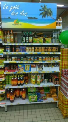 a grocery store filled with lots of food and condiments on the shelves next to each other