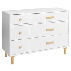 a white dresser with gold handles and drawers on the bottom, against a white background