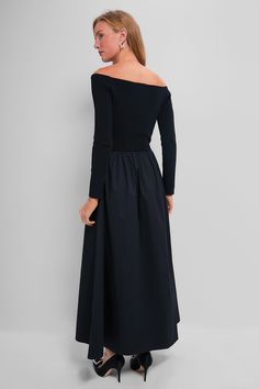 A black midi fit for old HollywoodThe Clea Dress is a stunning event gown with an off-the-shoulder neckline, a flattering fit-and-flare silhouette, and a mixed-media design. We are styling it with black heels and a clutch for date nights, dinner parties, and evening weddings.Our Favorite Details: Stretch-knit bodice Gathered skirt Pull-on style Material: 63% Viscose, 37% Nylon (bodice), 100% Cotton (skirt)Care: Hand wash cold, lay flat to dry Evening Weddings, Mixed Media Design, Date Nights, Evening Wedding, Black Midi, Gathered Skirt, Cotton Skirt, Dinner Parties, Media Design