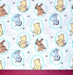 winnie the pooh and tiggers on white cotton fabric with blue circles around them