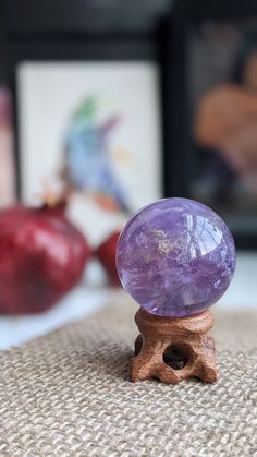 This gorgeous amethyst sphere is beautifully clear and loaded with rainbows from many angles. It is from our personal collection. Please see video for more details.  It measures 43 mm in diameter.  These are natural stones, so please understand there may be slight flaws. ----- About us: We are a couple of besties sharing our mutual loves of bones, crystals, and plants. Everything in the shop is either handmade or hand-selected with intent.  We do not use filters on any of our photos! We do choose the lighting (indoor, outdoor, time of day) that will highlight the item best, but everything we photograph is taken without filters, and will be clearly labeled as to whether you are getting this exact item or a similar one (in case of plants or crystals) We ship once a week due to our day jobs. Crystal Healing Chart, Amethyst Sphere, Red Jasper, Packing Material, Crystal Items, Natural Crystals, Bead Charms, Crystal Healing, Natural Stones