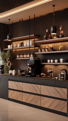 a kitchen with lots of counter space and shelves filled with coffee pots, mugs and other items