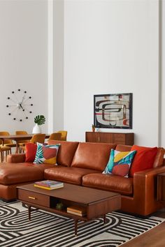 a living room filled with lots of furniture